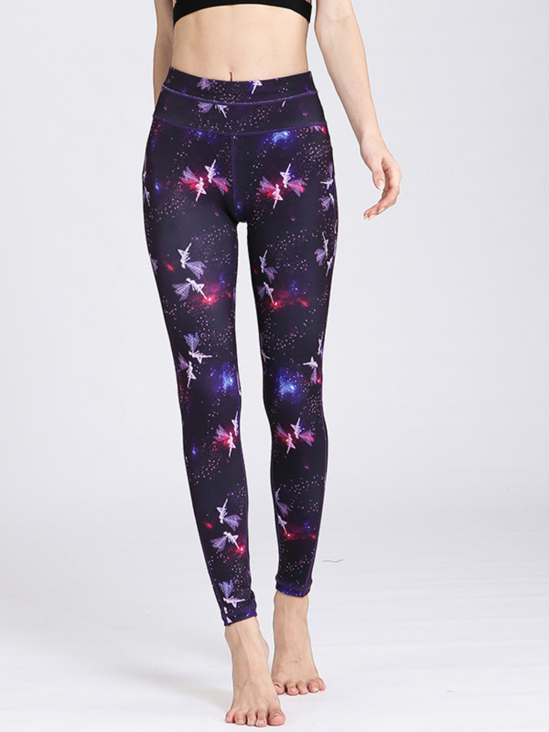 Purple cosmic print contour leggings with piping and fairy graphic