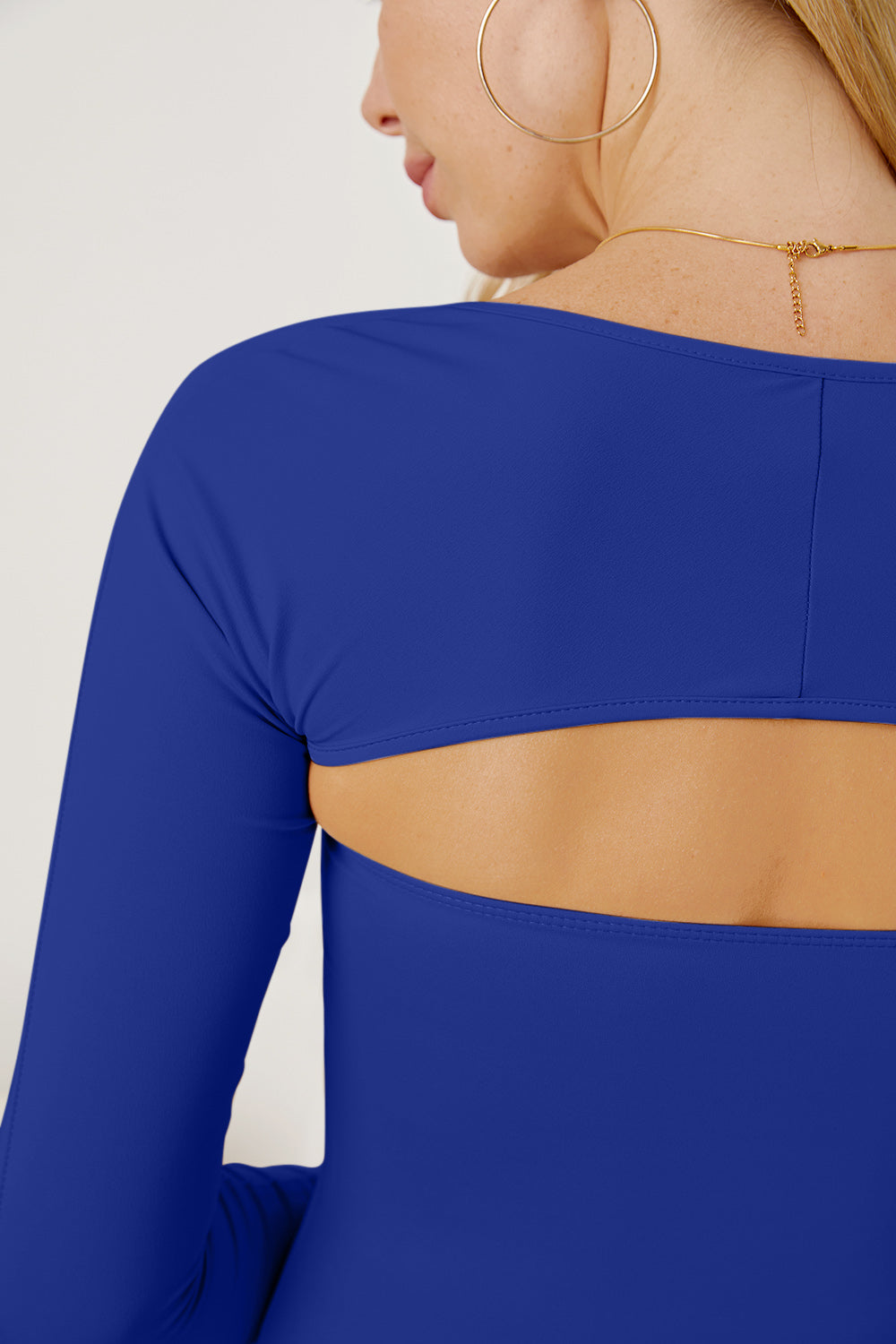 Royal Blue long sleeve bodysuit with open back detail