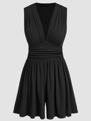 Black ribbed plunge romper with ruched waist and flared shorts