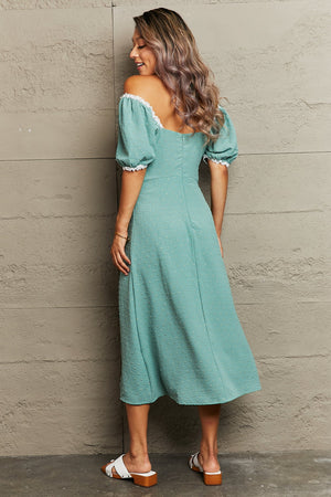 Teal dotted swiss off-shoulder midi dress with lace trim and puff sleeves