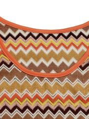 Zigzag knit two-piece set with orange trim and a colorful chevron pattern.