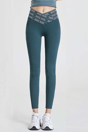 Deep Teal Angel Band Active Leggings with V-waistband and logo detail.