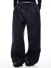 Men's dark grey wide-leg trousers with pleats and a subtle textured pattern.