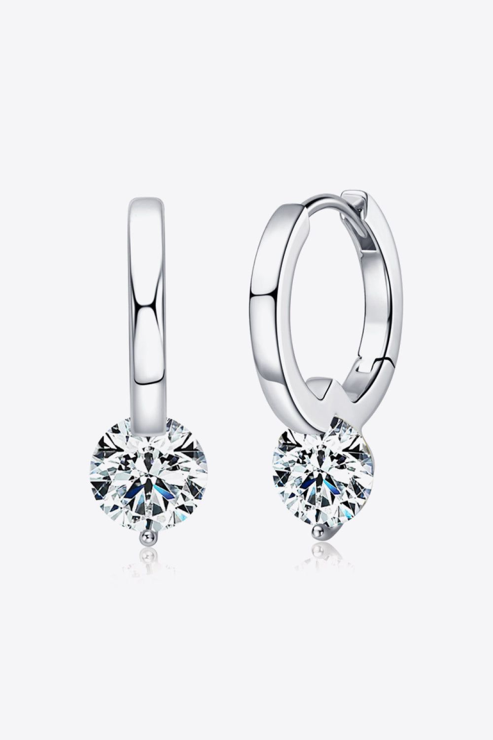 Silver solitaire gemstone huggie hoop earrings with a single round-cut clear stone.