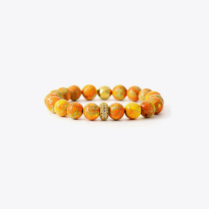 Rainbow Jasper bead bracelet in Tangerine with gold accents and a jeweled accent bead.