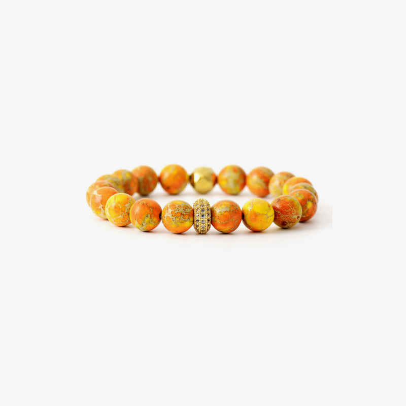 Rainbow Jasper bead bracelet in Tangerine with gold accents and a jeweled accent bead.