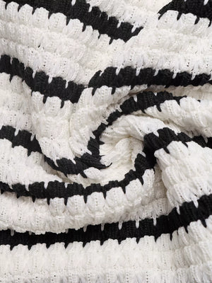 Chic Cutout Knit Mini Dress in black and white stripe pattern, textured knit fabric.