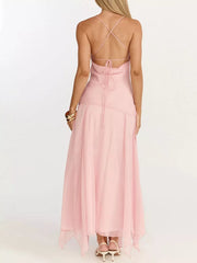Pink maxi dress with spaghetti straps and a lace-up back detail.