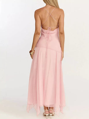 Pink maxi dress with spaghetti straps and a lace-up back detail.