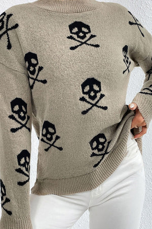 Khaki acrylic knit mock neck sweater with allover black skull and crossbones motif.