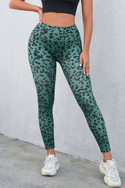 Green leopard print performance leggings with a high waist.