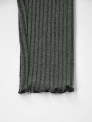 Dark gray ribbed knit top with lettuce hem detail
