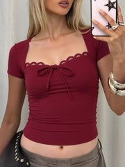 Wine red cropped t-shirt with lace trim and tie-front detail