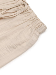Chic tan waist-tie flare trousers with elasticated waistband and drawstring detail.