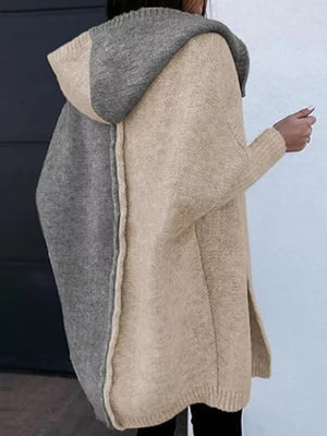Two-tone hooded knit cardigan in camel and gray acrylic with side slits.