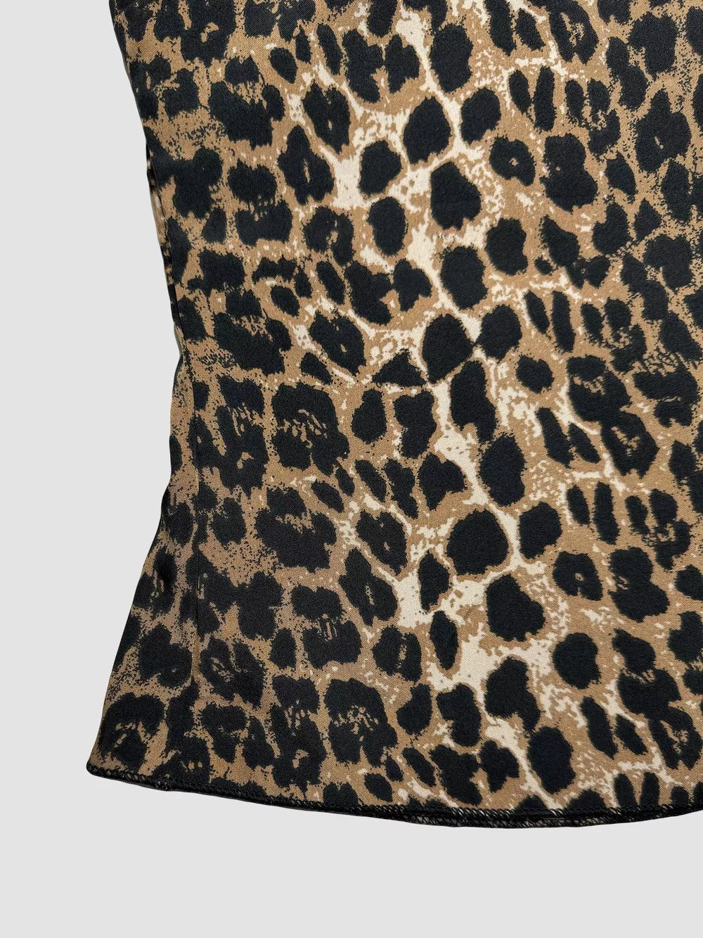 Leopard print cami crop top with a back tie detail.