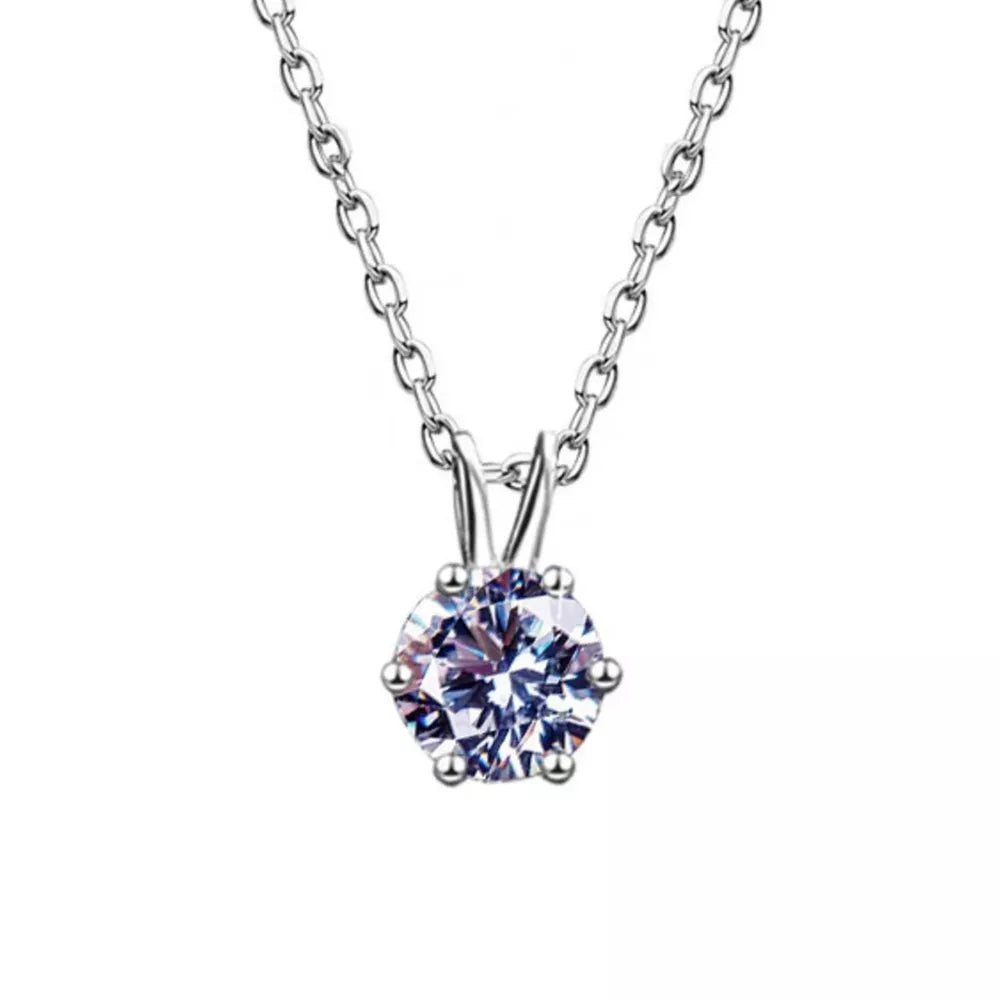 Elegant moissanite pendant necklace in sterling silver with a delicate chain.