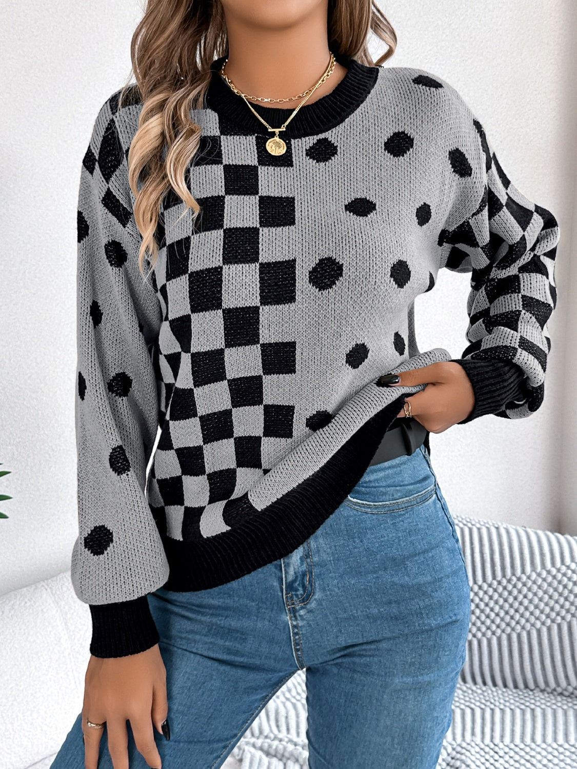 Gray acrylic sweater with checkerboard and dot intarsia pattern, crew neck, long sleeves.
