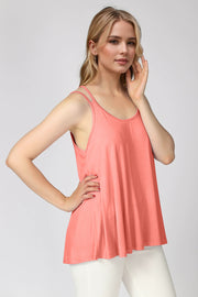 Coral trapeze cami with double straps and a scoop neckline.