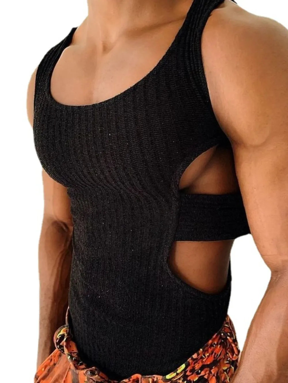 Black ribbed tank top with side cutouts and strap detail.