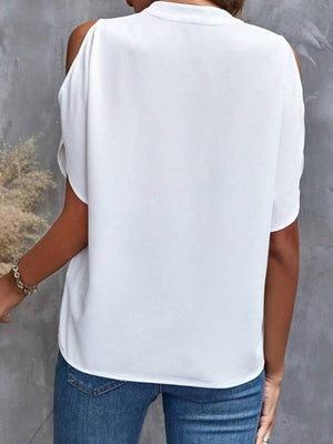 White open-shoulder blouse with mandarin collar and short sleeves.