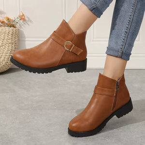 Caramel ankle boots with buckle detail and side zipper, block heel.