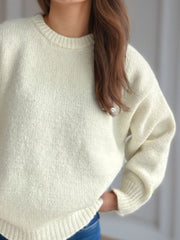 Oversized crewneck sweater in white textured knit with ribbed cuffs and hem.