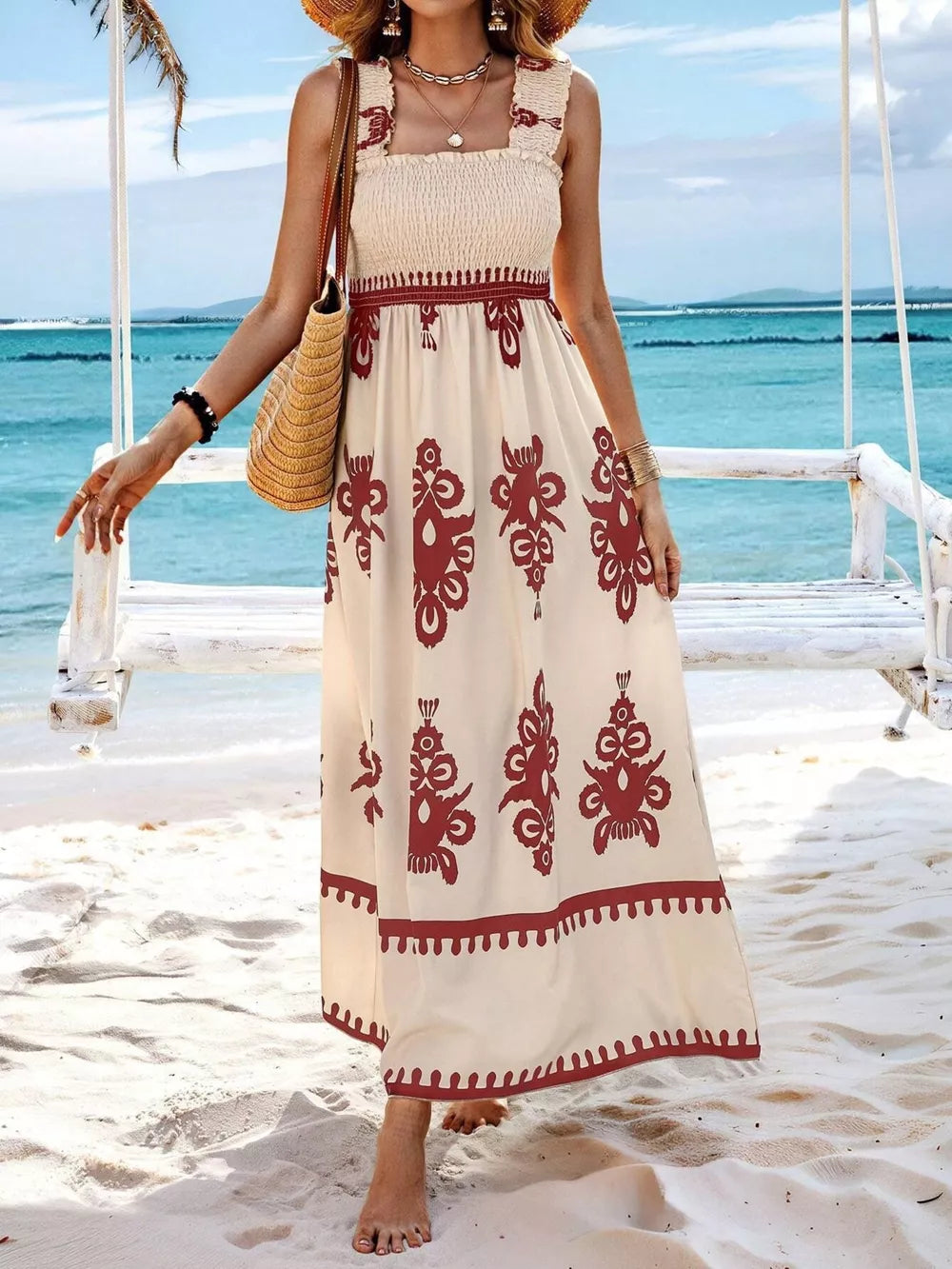 Cream maxi dress with smocked bodice, square neck, and red tribal print.