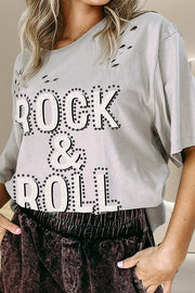 Light gray distressed cotton t-shirt with a bold "ROCK & ROLL" graphic and studded details.