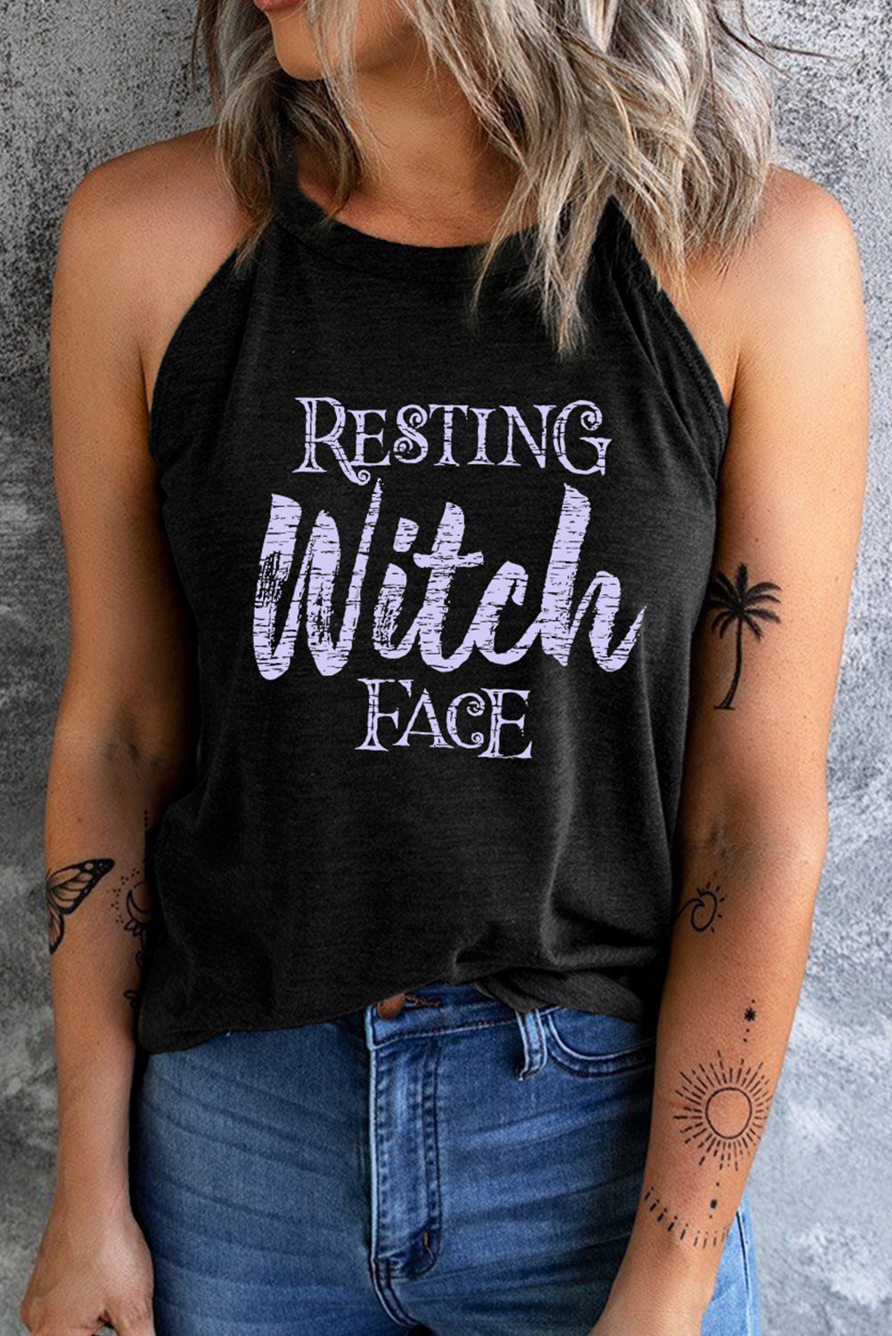 Black halter tank top with "Resting Witch Face" graphic print