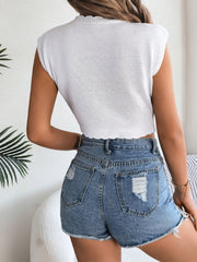 White scalloped crochet crop top with short sleeves, shown from the back.