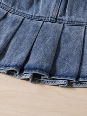 Toddler denim pleated skirt with a frayed hem detail.