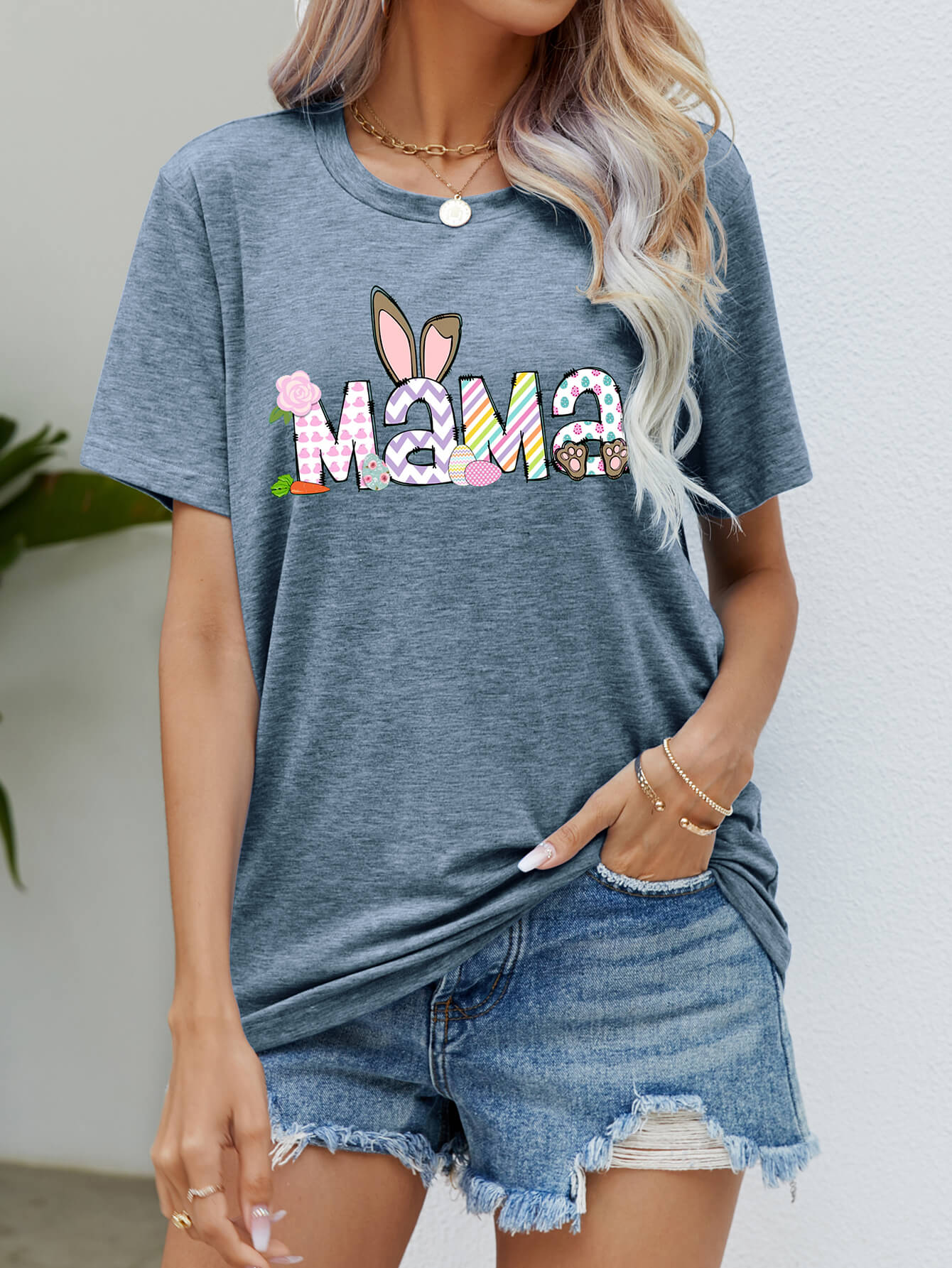 Heather Gray Easter Mama graphic t-shirt with bunny ears and colorful Easter egg details.