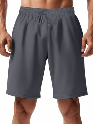 Light gray chino shorts with drawstring waist and pockets.
