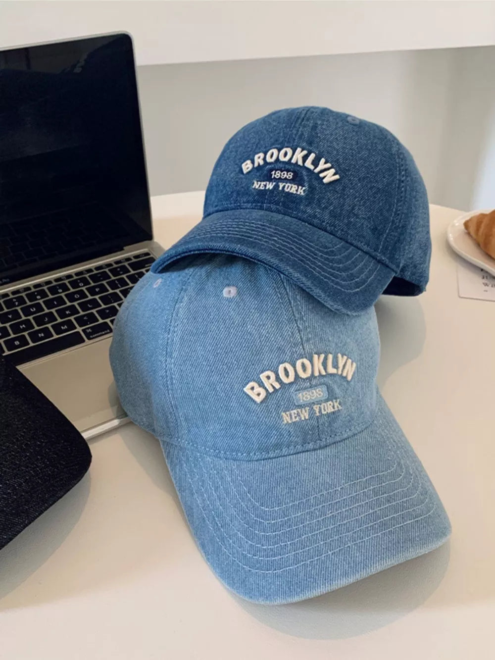 Light blue denim baseball cap with white Brooklyn embroidery