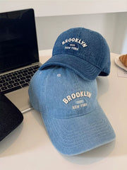 Light blue denim baseball cap with white Brooklyn embroidery