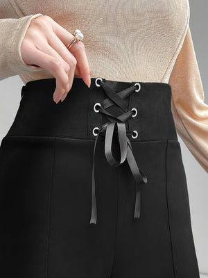 Black lace-up waist flare trousers with a corset detail and silver grommets.
