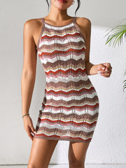 Chevron knit mini dress with halter neck in multi-color stripes.