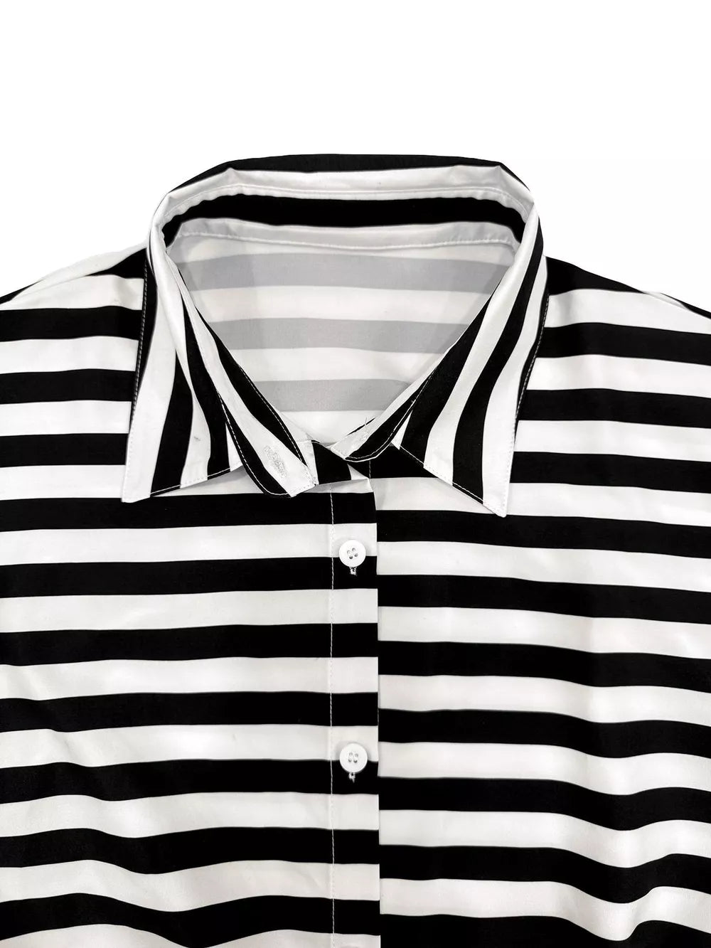 Black and white striped collared button-front romper ensemble detail