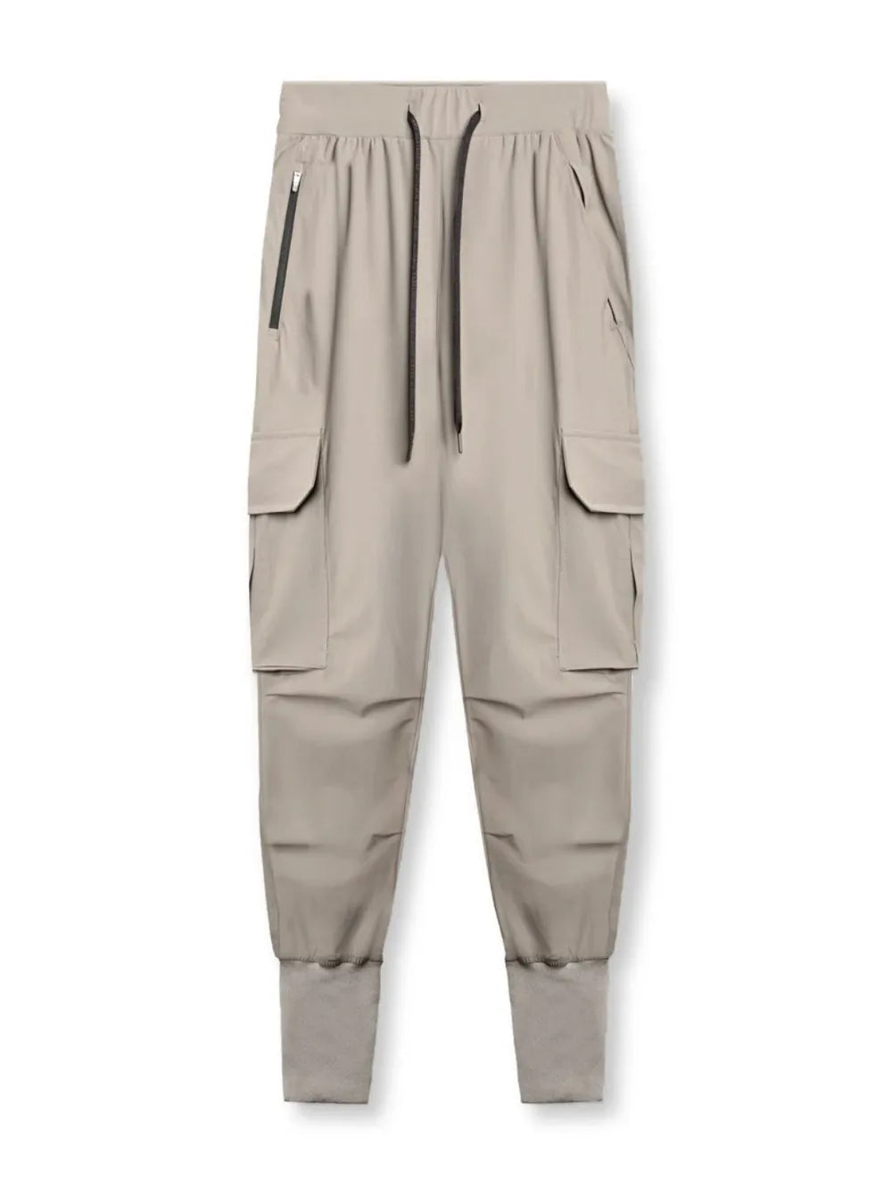 Technical cargo joggers in mocha with ribbed cuffs and zippered pockets.