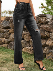 Black distressed flare denim jeans with ripped details