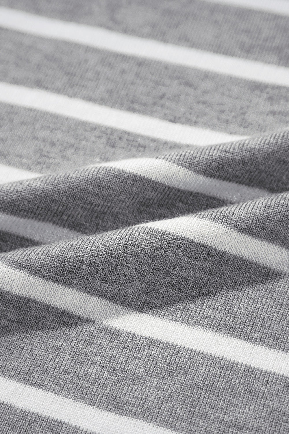 Light gray and white striped knit t-shirt with a boxy fit and contrast trim detail.
