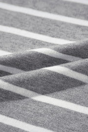 Light gray and white striped knit t-shirt with a boxy fit and contrast trim detail.