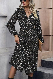 Black floral midi wrap dress with button front and long sleeves