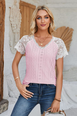 Pink eyelet raglan blouse with white lace short sleeves and V-neck.