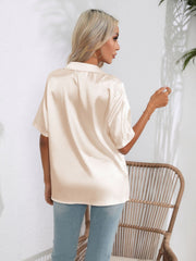 Champagne satin collared shirt with short sleeves, shown from the back.