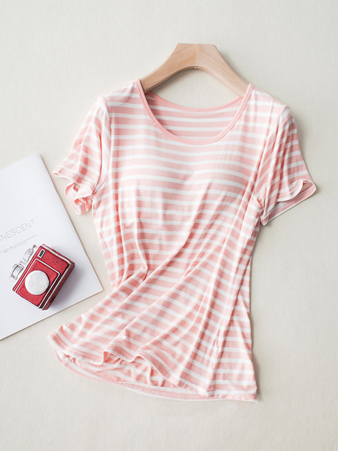 Pale blush and white striped built-in bra tee with a scoop neck and short sleeves.