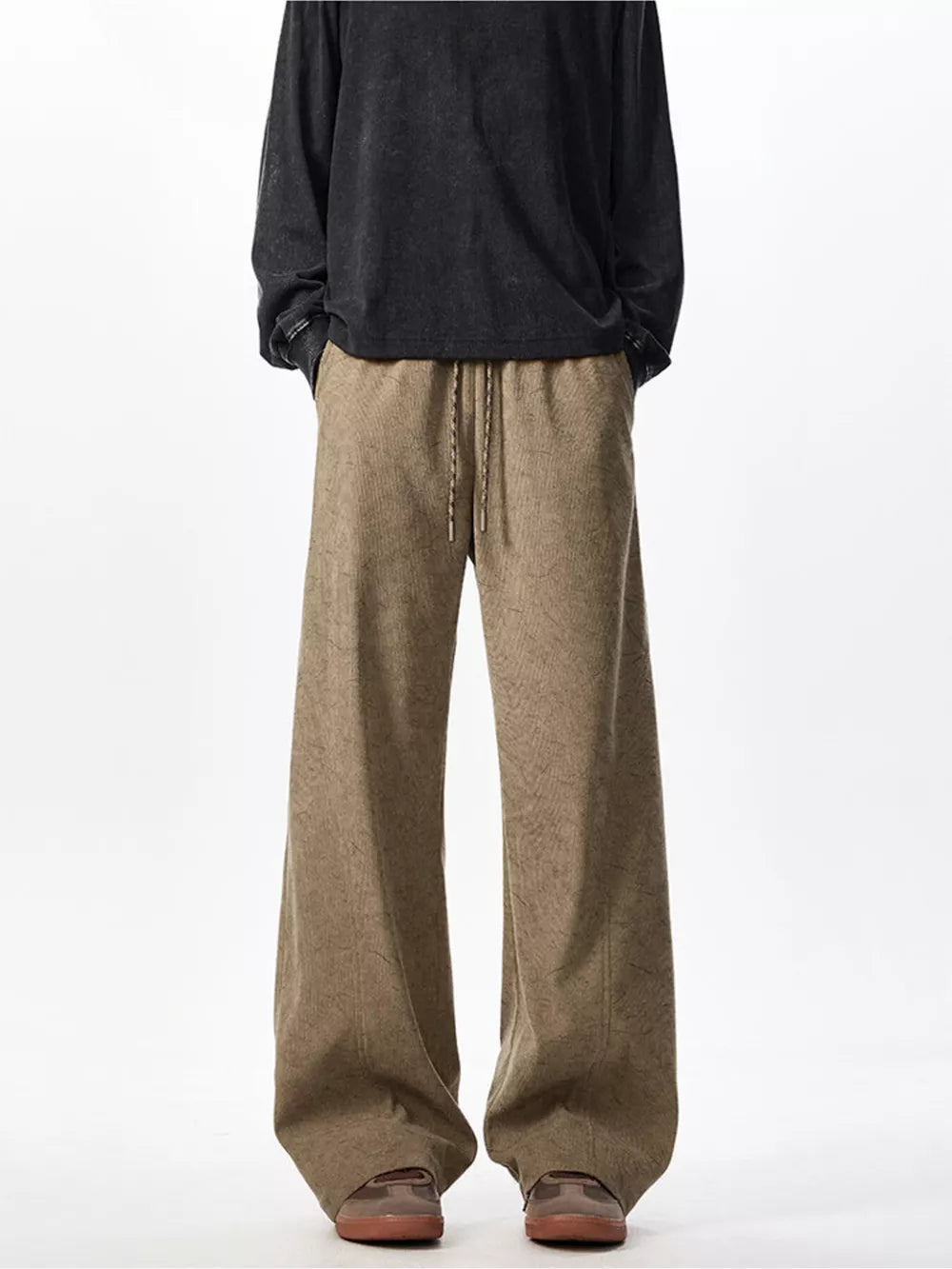 Textured wide leg drawstring sweatpants in khaki with a relaxed fit.