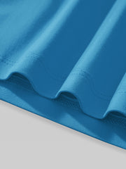 Toddler blue t-shirt hem detail with double stitching.