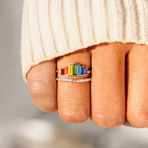 Rainbow prism stacked sterling ring set with colorful baguette stones and a textured band.